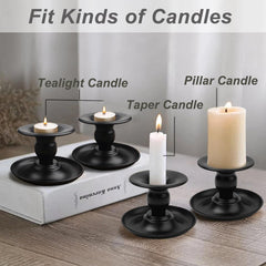 Set 2 črnih kovinskih svečnikov za stožčaste in stebričaste sveče