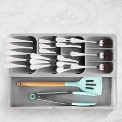 Raztegljiv plastični organizator z 9 predelki za kuhinjsko posodo