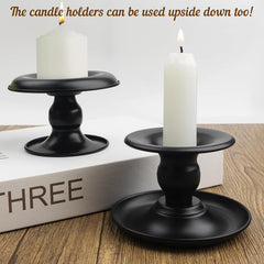 Set 2 črnih kovinskih svečnikov za stožčaste in stebričaste sveče