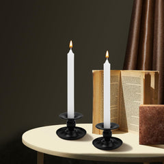 Set 2 črnih kovinskih svečnikov za stožčaste in stebričaste sveče